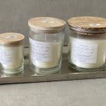 נר בכלי זכוכית ומכסה עץ