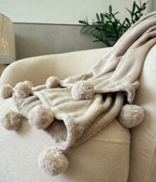 כירבולית פונפונים בז'