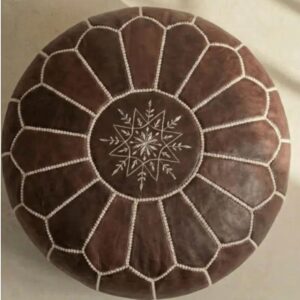 Brown round Moroccan leather pouf ottoman with white embroidered star and radial stitching, boho floor cushion footstool