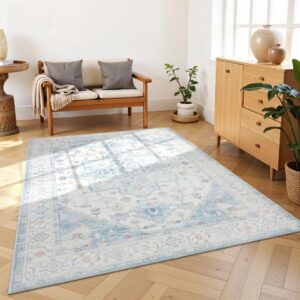 Light blue vintage rug on herringbone floor in bright Scandinavian living room with natural wood furniture and plants